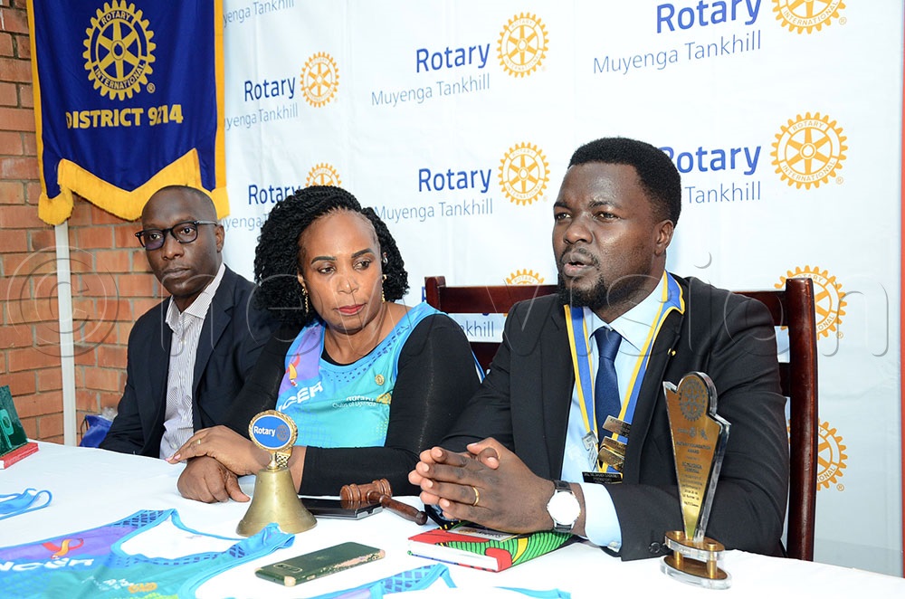 Kenneth Rubango (R), the president of the Rotary club of Muyenga Tankhill addresing the press as Rebecca Mwesigwa Luwagga (C, the president Elect Rotary Club of Muyenga Tankhill and Stephen Mwesege, the acting chief information security officer at Post bank look on. This was at a reception of partners for the coming Rotary Cancer Run slated for Sunday. The press conference was at Hotel International Muyenga on Thursday August 28, 2025. (Credit: Lawrence Mulondo)