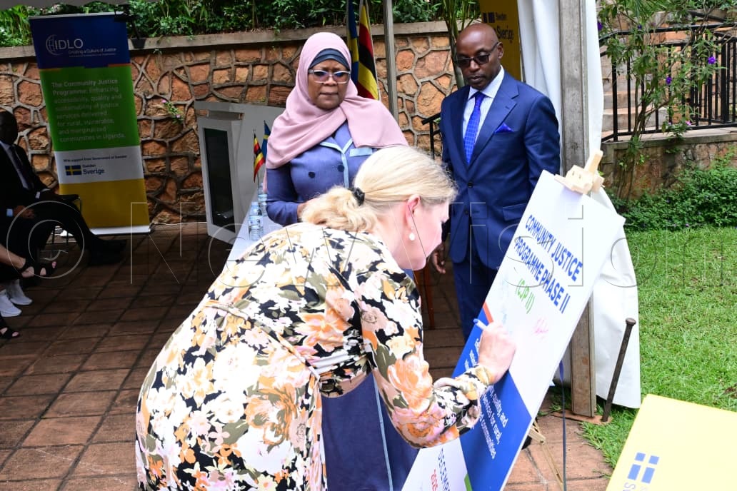 H.E. Maria H&aring;kansson signing on the board.
