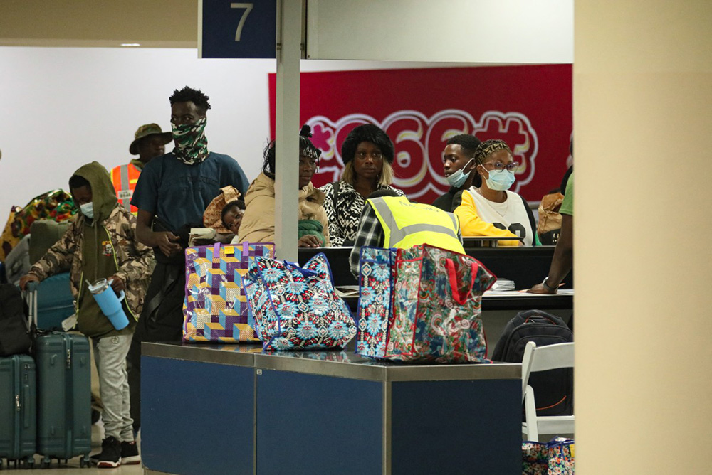 Ghanaian nationals evacuated from South Africa following xenophobia attacks arrive at Accra International Airport in Accra on May 27, 2026. (Photo by Nipah Dennis / AFP)