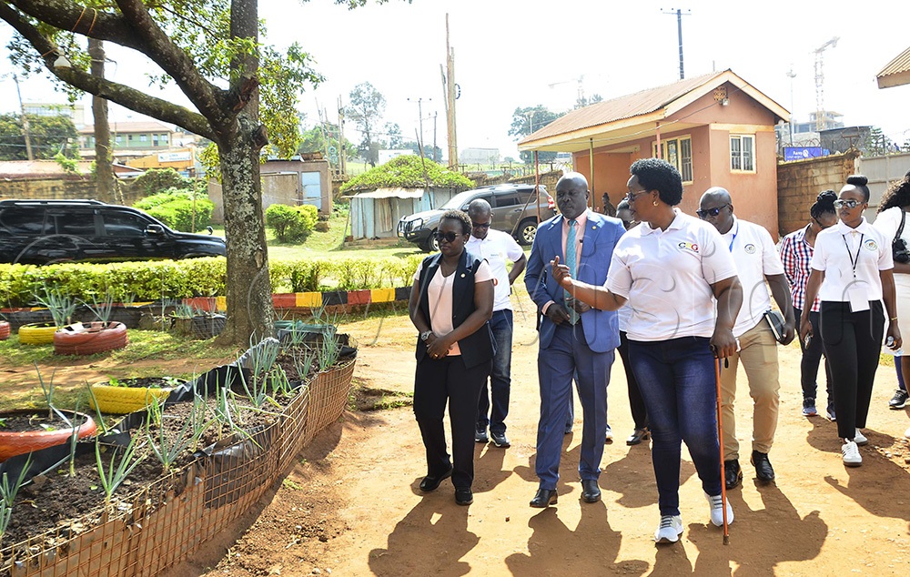 From left to Right: Elizabeth Mushabe, Rotary Club of Upper Kololo president, Gerald Obai, District Governor for District 9213, listen to Mary Kyomugisha, Naguru Remand Home in charge, as other Rotarians look on during the courtesy visit at Naguru Remand Home in Kampala on 14th August 2026. (Photo by Juliet Kasirye)