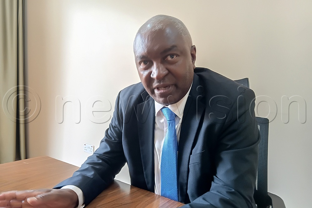 Prof. Everd Maniple from the Kabale University public health department speaking during the training. (Photo by Doreen Musingo)