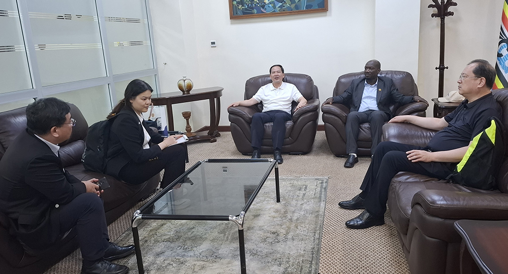 Vice Governor of Shandong Province H.E. Wen Nuan (middle) with part of his delegation meeting Busoga Consortium for Development's Director General Anthony Mula (2nd right) at his BCD office on October 11th, 2025. 