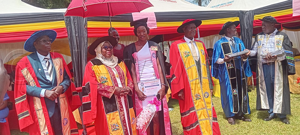 One of the best students awarded a certificate. (Credit: Juliet Akello)