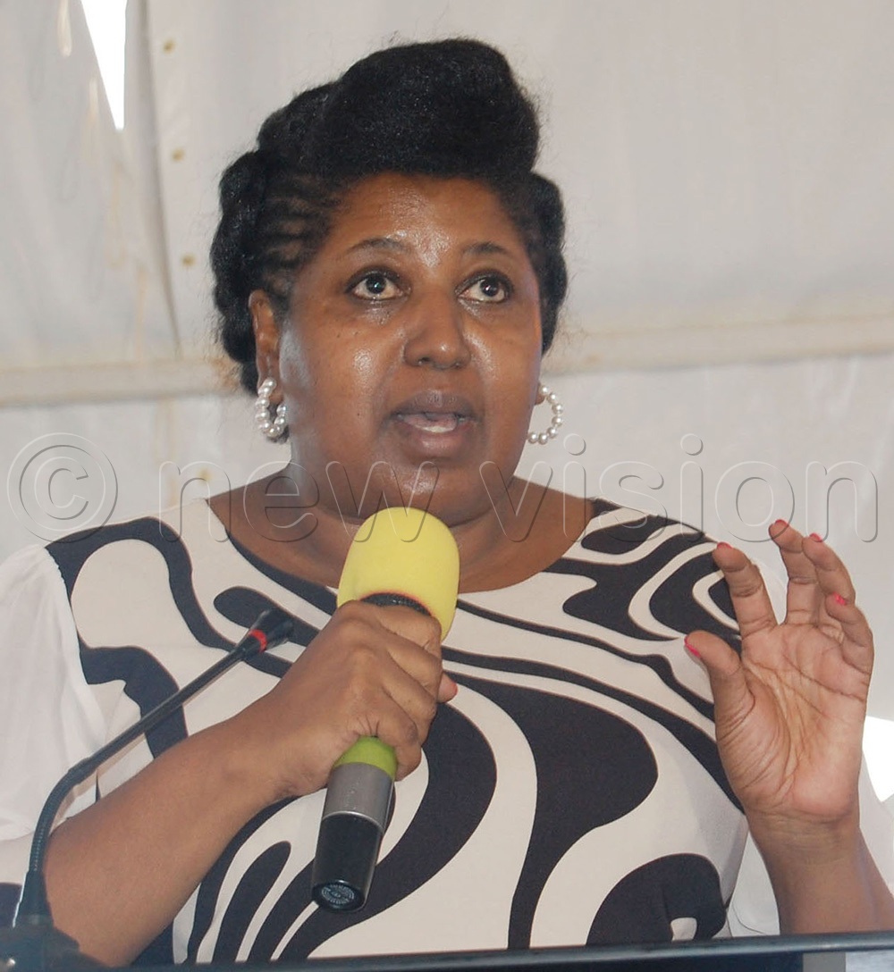 Sarah Kagingo delivers her apologetic remarks on behalf of the parents. (Photo by Mathias Mazinga)