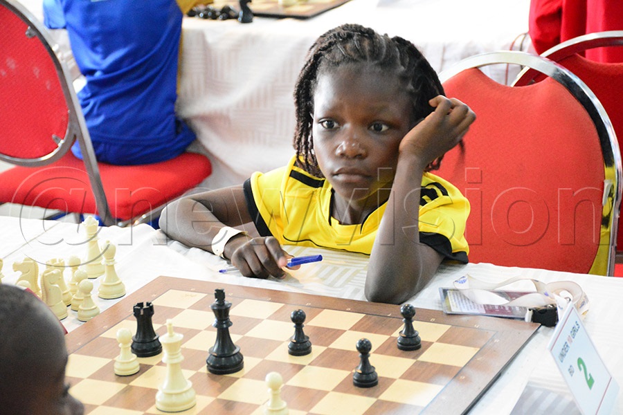 Uganda's Melisa Edinansi in action in the girls' U-10 category during the Africa Youth Chess Championship. Photo by Michael Nsubuga