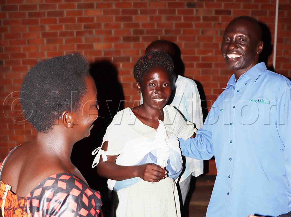 Emmanuel Okello (right) and his daughter and another relative, after being set free. (Credit: Hudson Apunyo)