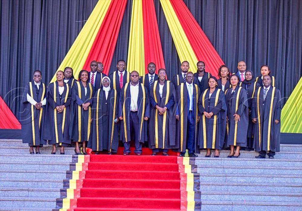 Clerks of Parliament who are administering the Oath in a group photo.