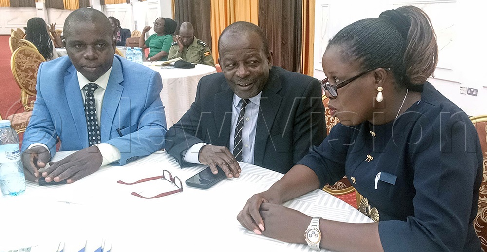 Charles Lwanga, Head of Election Management at the Electoral Commission (left), Dr Simba Kayunga, Commissioner in charge of Kampala Central Region (centre), and Jennifer Kyomuhangi, Kampala Regional Elections Officer, during a post-election validation survey in Kampala on July 13, 2026. (Photo by Wilfred Sanya)