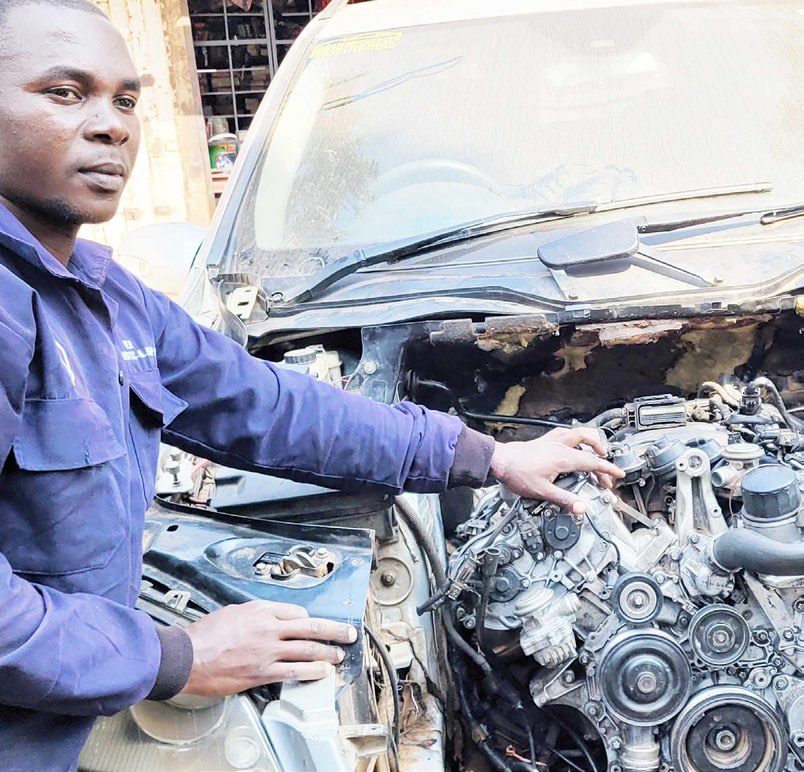 Makanika Ng'alaga Yingini Enkola Empya.