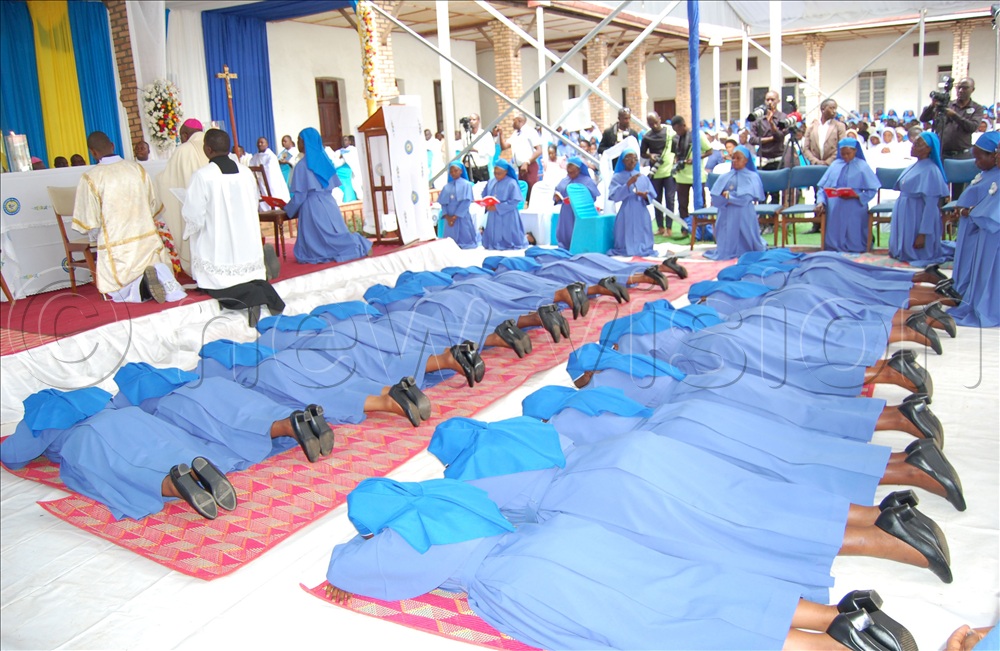 The 19 Sisters of the Catholic Religious Institute of the Daughters of Mary who took their perpetual vows prostrate as the congregation recites the litany of the saints during their function at Bwanda Convent, in  Kalungu district on Thursday, January 8, 2026. Prostrating is a sign of humility, obedience and total surrender of self to God. 