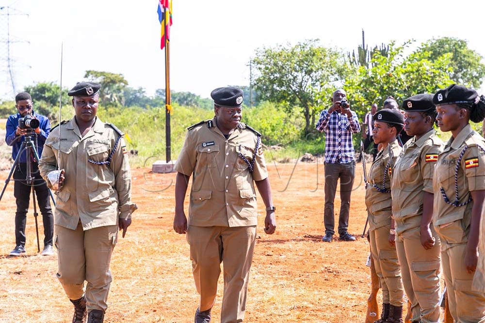 Obwona inspecting a guard of honour at Nakitoma sub-county police station in Nakasongola district. (Credit:  Frederick Kiwanuka)