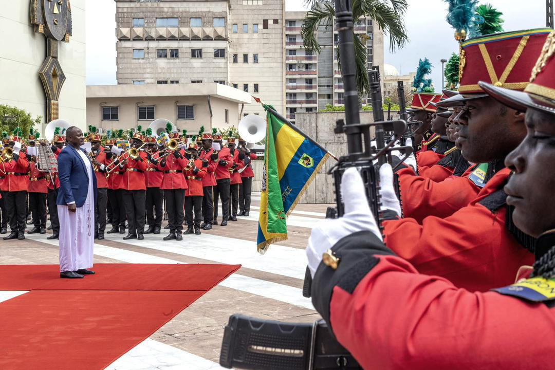 Kaliisa receiving a guard of honour at State House in Libreville on September 15, 2025. (Credit: MoFA photo)