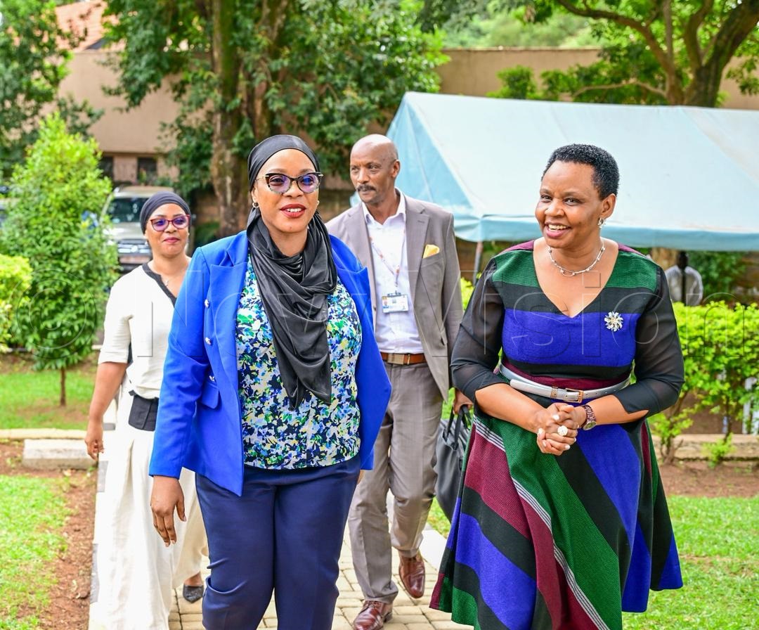 Hajjat Amina Mukalazi, State Minister for Investment and Privatization and Col Edith Nakalema. (Credit: Miriam Namutebi)