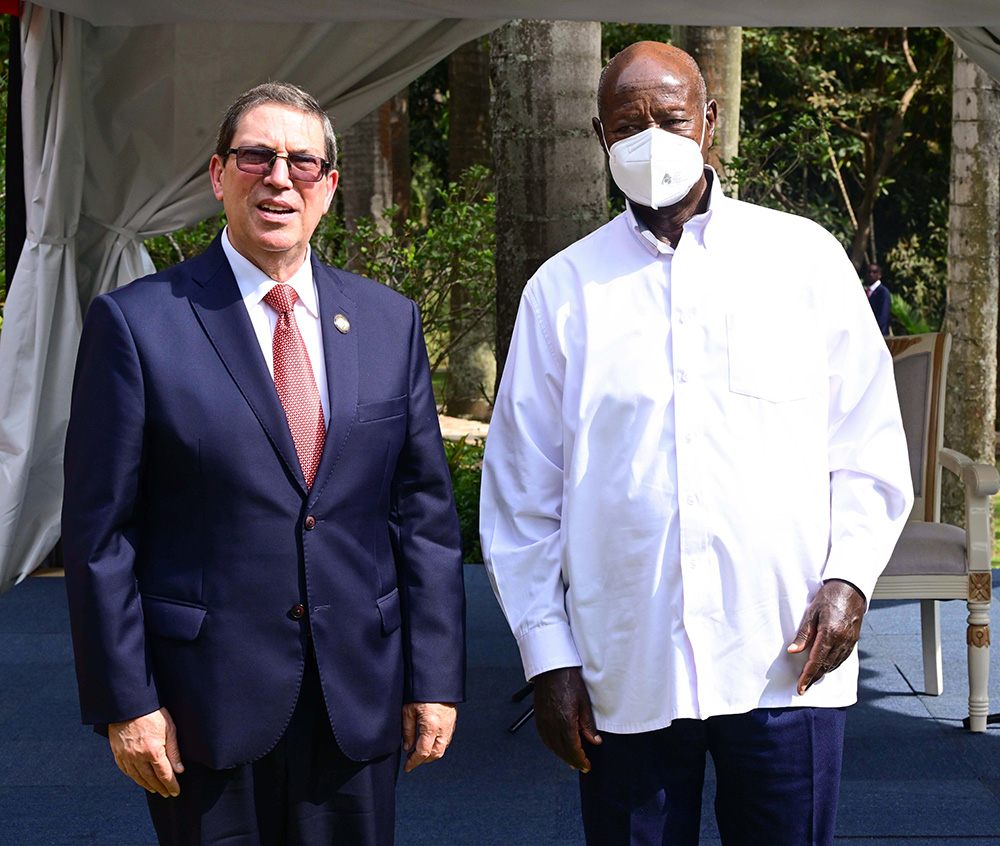 Cuba's Foreign Affairs Minister Bruno Rodriguez poses for a photo with President Museveni on the sidelines of the NAM Ministerial meeting at Speke Resort Munyonyo on Wednesday. (Credit: PPU)