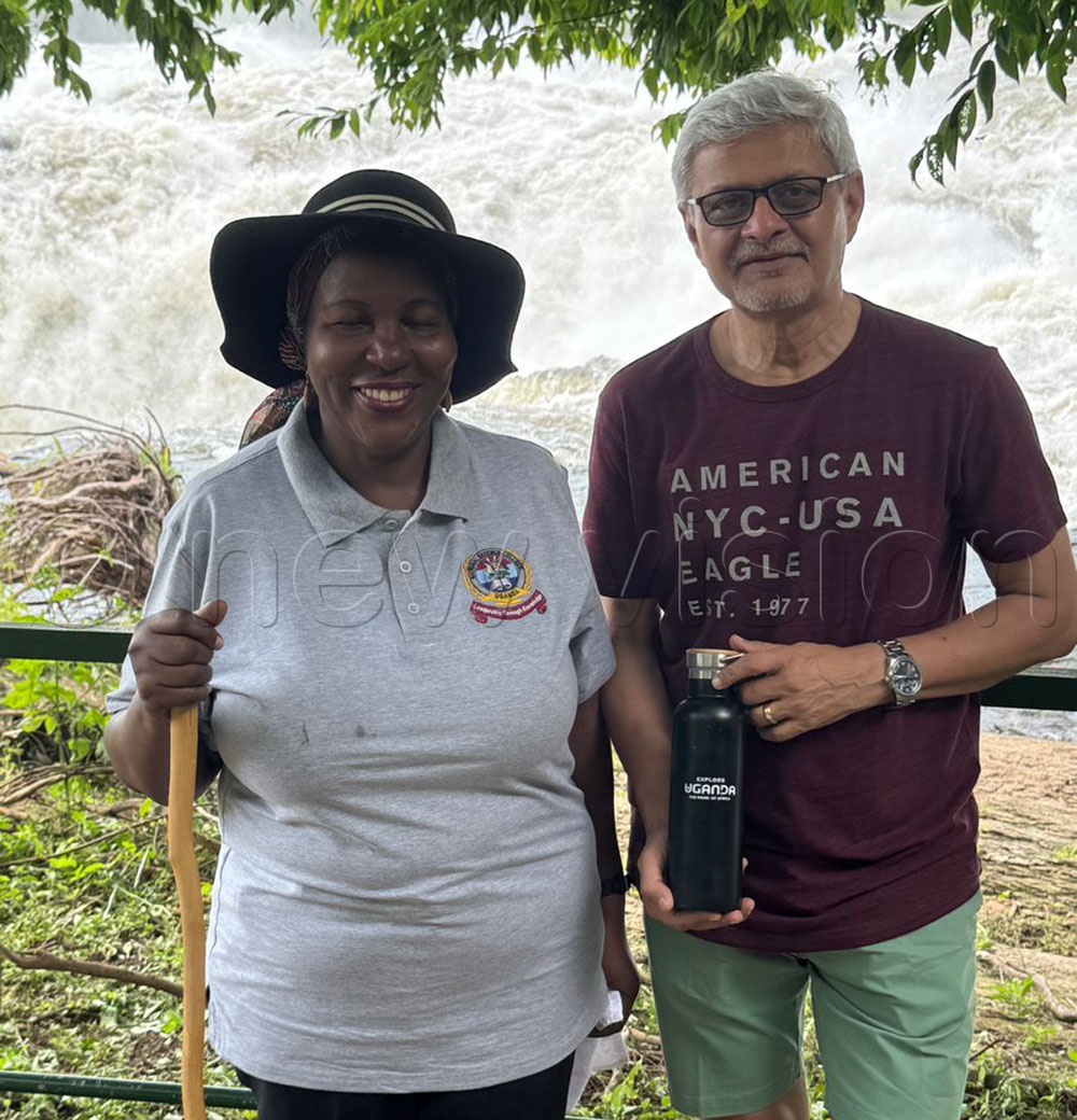 Uganda's High Commissioner to India, Prof. Joyce Kakuramatsi Kikafunda (left) with a guest at Murchison Falls.