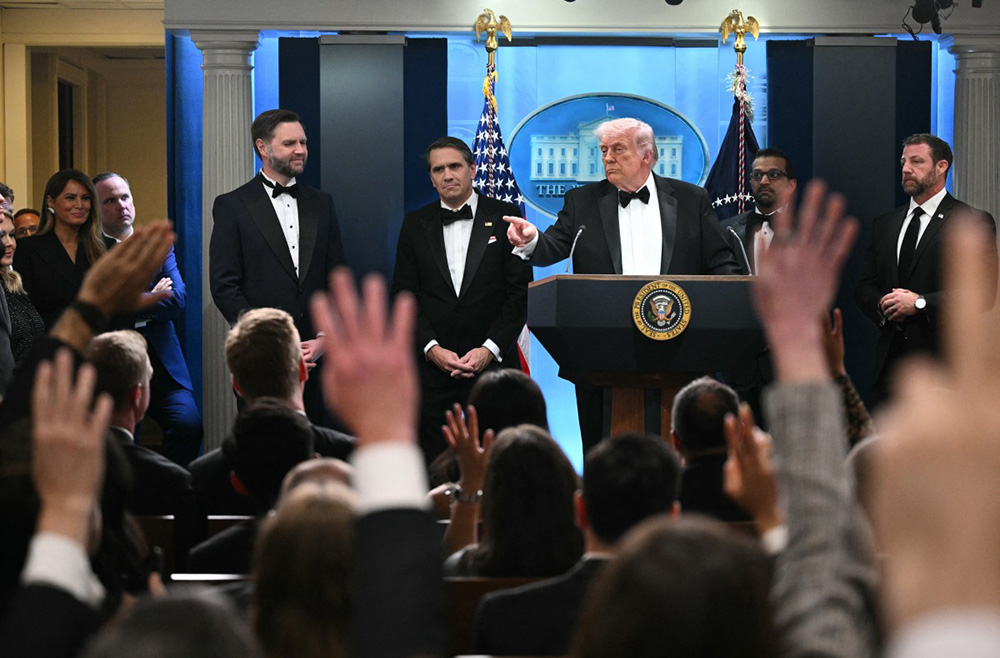    US President Donald Trump takes questions, flanked by US Vice President JD Vance, FBI Director Kash Patel, US Secretary of Homeland Security Markwayne Mullin and Acting Attorney General Todd Blanche. (Photo by Mandel NGAN / AFP)