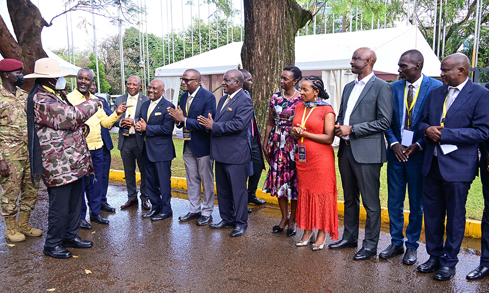 President Museveni interacts with some of the members of the business community during the Kampala Business Forum at Serena Hotel in Kampala on Sunday. (In yellow) is Deputy Speaker Thomas Tayebwa. (PPU Photo)