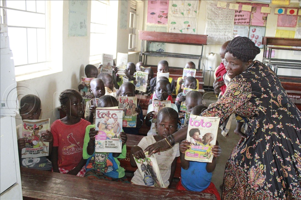 Teacher Ilukol Zena in class at Namekwii community Primary school in Napak district. Teachers do more than teaching.