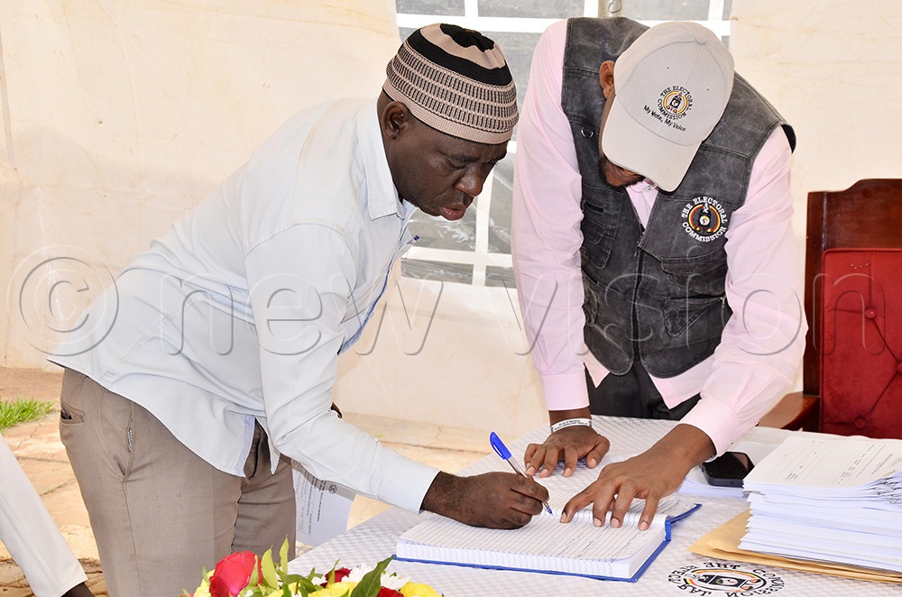 Hannington Muteesa picking nomination forms for the 2026 general election. (Photo by Ronnie Kijjambu)