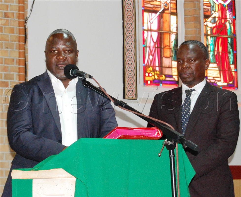 The Chairman of SAAFU, Edward Kanyikie (left) and Michael Ssebbowa Mukasa (a member of the SAAFU committee) deliver their message of gratitude during the fundraising function at Lubaga Cathedral on Sunday, October 12, 2025. 