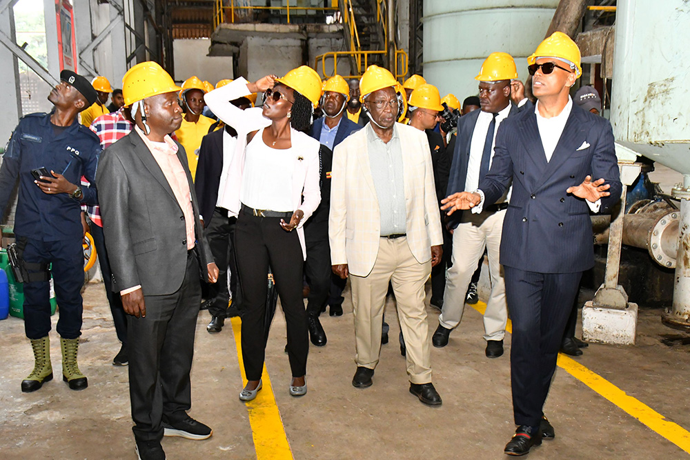 Modern Group Chairman Ashish Monpara (right) leading the Minister of Trade, Industry and Cooperatives Francis Mwebesa (2nd right), the Minister of State for Investment and Privatisation Evelyn Anite (middle) and the Minister of State for Trade David Bahati (2nd left) in touring Kaliro Sugar factory on Friday in Kaliro district during its launch. (Photo by Donald Kiirya)