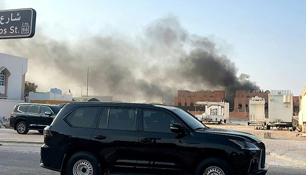 This frame grab taken from an AFPTV footage shows smoke billowing after explosions in Doha's capital Qatar on September 9, 2025. (AFP)