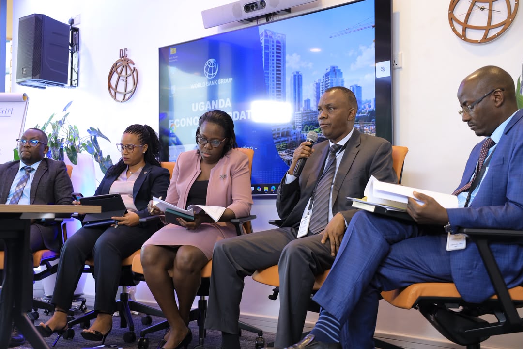 Kaggwa (2nd right) during the launch of the report by World Bank in Kampala.