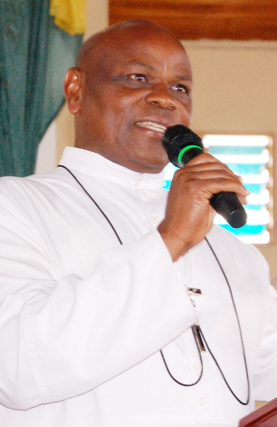 The Headteacher of SHACK, Bro. Wanambwa Martin delivers his thanksgiving speech. (Photo by Mathias Mazinga)