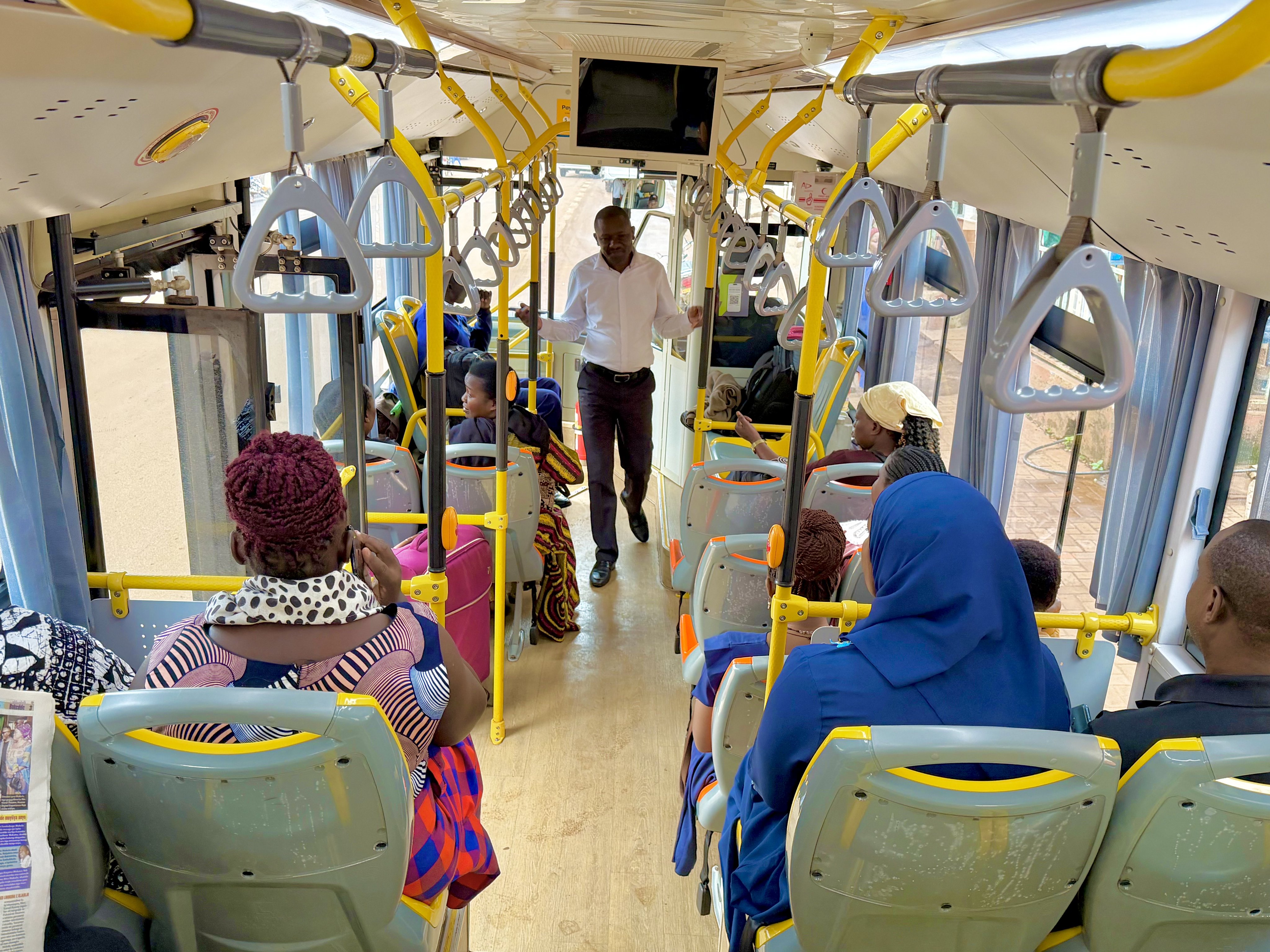 Passengers in Jinja seated in one of the E-Bus Xpress Kiira Ltd (EBX) E-buses plying the Jinja - Iganga route. (Credit: E-Bus Xpress Kiira Ltd)