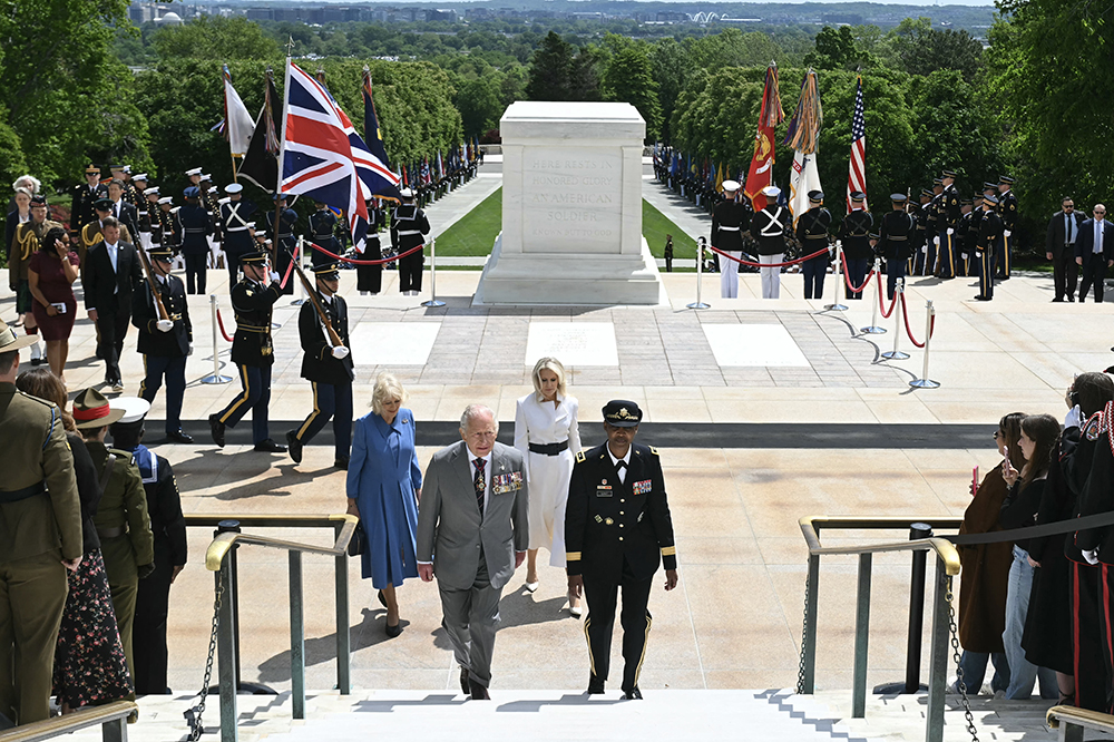 Britain's King Charles III and Queen Camilla arrive to lay a wreath at the tomb of the unknown soldier in Arlington National Cemetary in Arlington, Virginia, on April 30, 2026. 