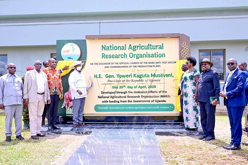 President Yoweri Museveni (4th left) in a group photo with L-R; the Minister of State for Agriculture, Fred Bwino Kyakulaga, the State Minister for Animal Industry, Bright Rwamirama, the Minister of Agriculture, Animal Industry and Fisheries (MAAIF), Frank Tumwebaze, the Director General of NARO, Dr Yonah Baguma, State Minister for Fisheries, Hellen Adoa, MAAIF&rsquo;s Permanent Secretary, Major General David Kasura Kyomukama and other officials. This was during the launch of the NARO Anti-Tick Vaccine and the commissioning of the new Anti-Tick Vaccine production plant at the NARO National Livestock Resources Research Institute (NaLIRRI) in Nakyesasa, Wakiso District on April 30, 2026. (Photo by Miriam Namutebi)