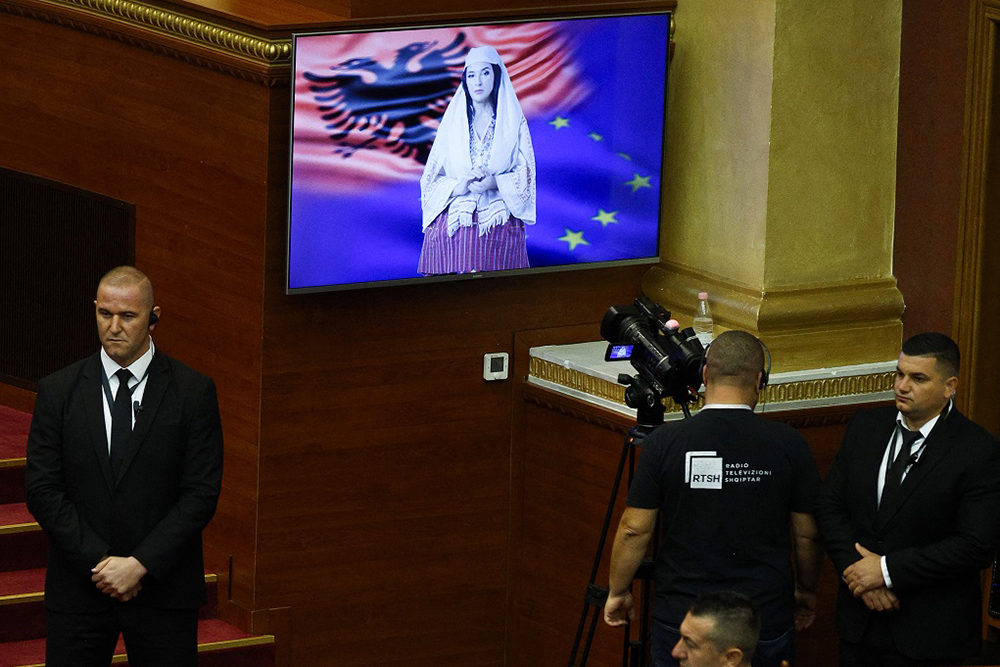 Albania's new AI-generated minister "Diella" speaks during the parliamentary session for the voting of the new government of Albania, in Tirana on September 18, 2025.