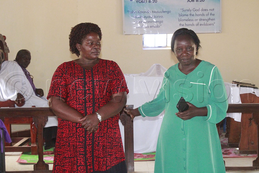 Rebecca Nankanja (left) head teacher Sentema CU Primary School with Samalie Nanvunanwa Wakiso district education officer in charge of special needs education. (Photo by Ritah Mukasa)
