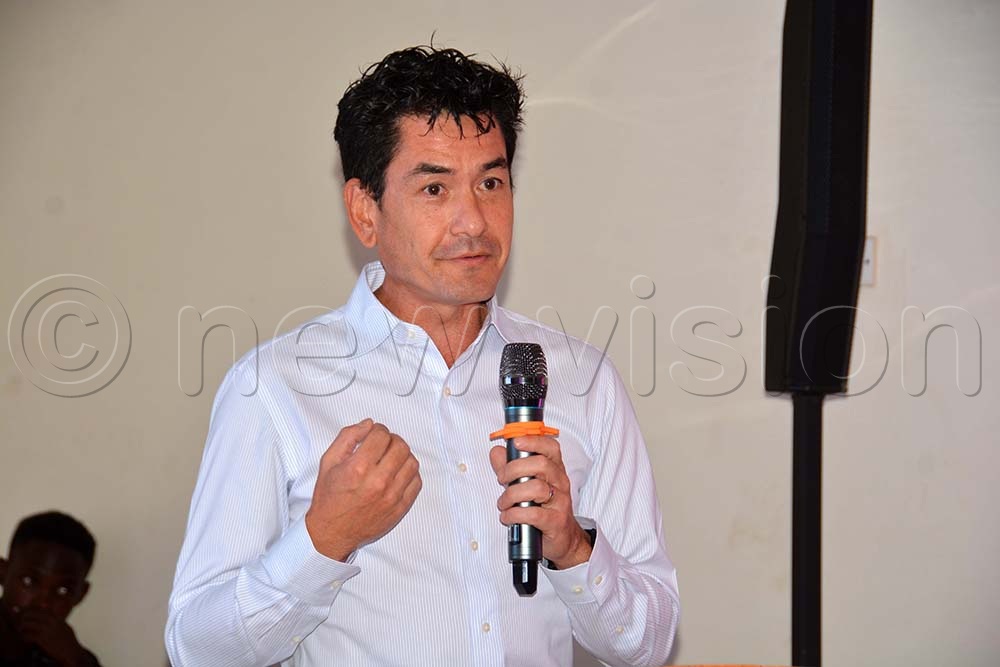 Head of Programs See You Foundation Netherlands Japer Oei addressing participants during the persons with disabilities workshop organised by NUDIPU at Hotel Africana in Kampala.(Credit: Francis Emorut)