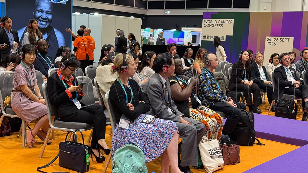  Delegates at the World Cancer Congress 2026 in Hong Kong listening during a session. (Credit: John Musenze)