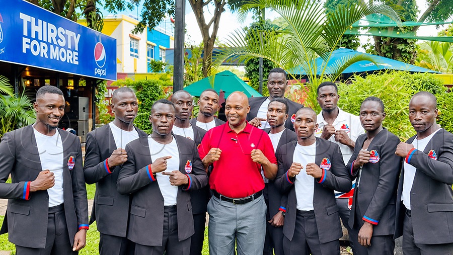 Friends of Boxing's nine-member squad flagged off for the Africa Boxing Championship in DR Congo. Photo by Fred Kisekka