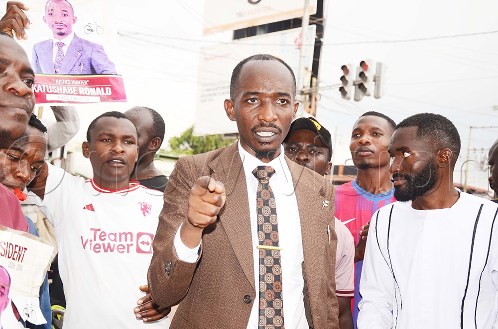 Ronald Katushabe speaking to media in Ntinda after picking nomination forms at the electoral commission. (Photo by Isaac Nuwagaba)