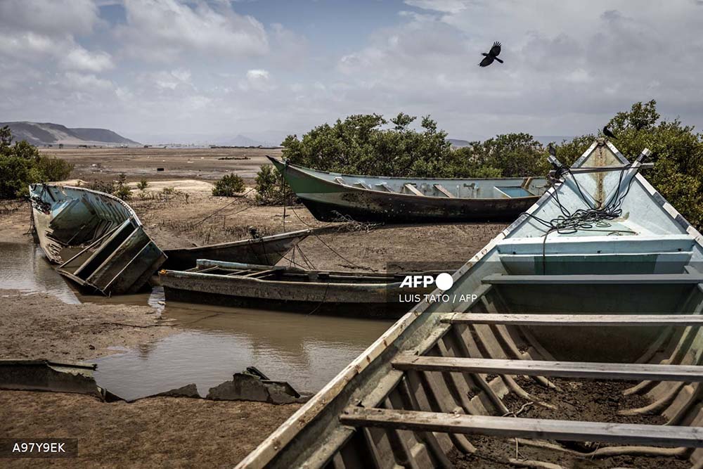 Boats seized from smugglers attempting to transport migrants to Yemen are stored at a Coast Guard post in Khor Angar, on April 12, 2026. In Djibouti, dozens of men are making the days-long trek home after their plan to cross one of the world's deadliest migration routes from Africa to the Gulf has failed.