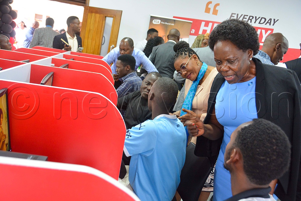 The executive director of Butabika Hospital Dr Juliet Nakku (third right) and other guests interacting with learners during the launch of digital community centre at Butabika Hospital in Kampala on Friday March 6, 2026. (Photo by Francis Emorut)
