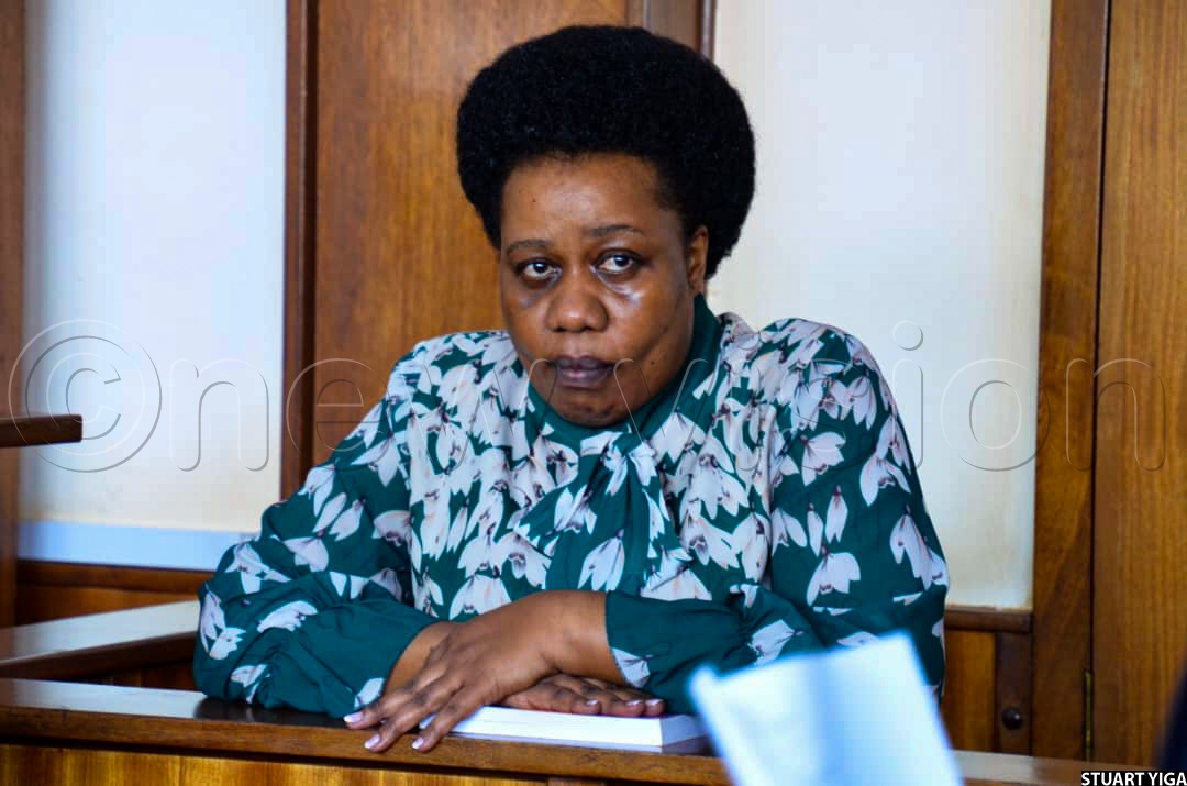 Centre for Constitutional Governance executive director, Sarah Bireete, in a court dock, following the proceedings. (Credit: Stuart Yiga)