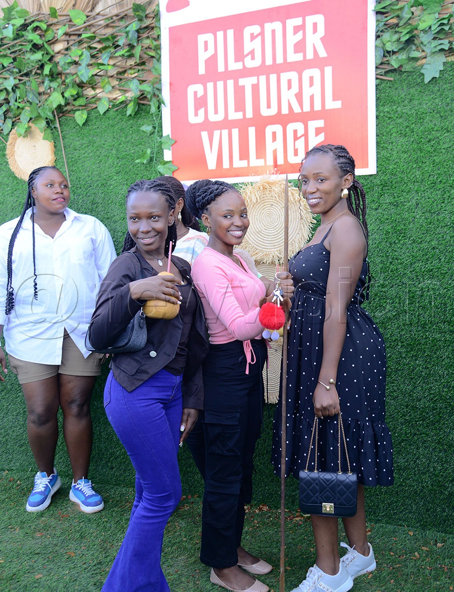 They were taking photos at the temporary cultural village that was set up during Bakiga Nation. Photo by Ignatius Kamya