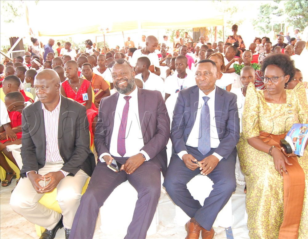 Lands minister Judith Nabakooba (right) with other guests during the function.