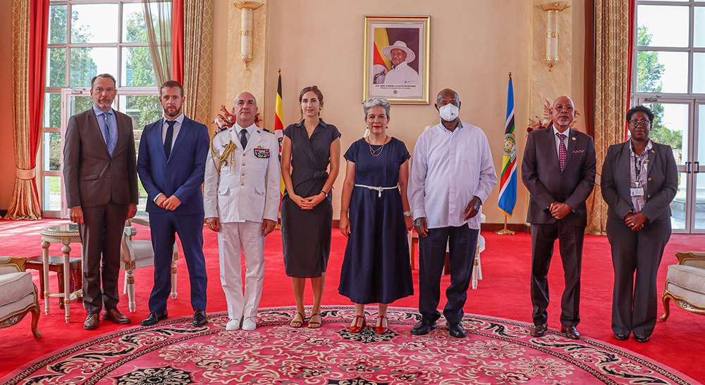 President Museveni poses for a group photo with the French delegation.