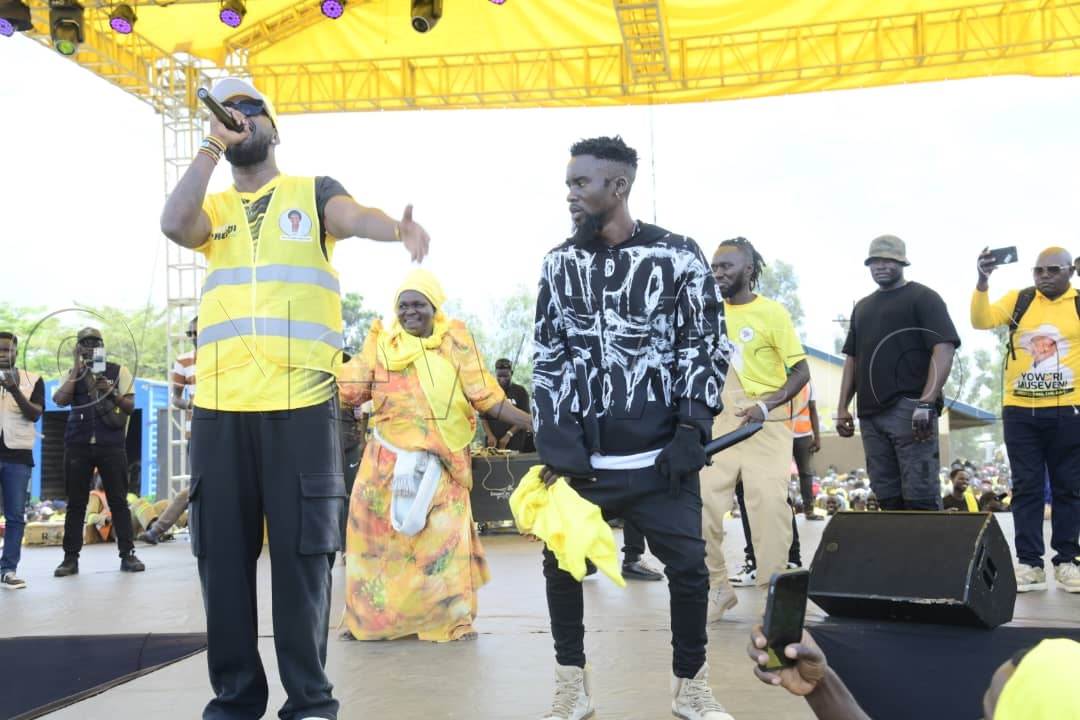Musician Eddy Kenzo on stage at the rally.