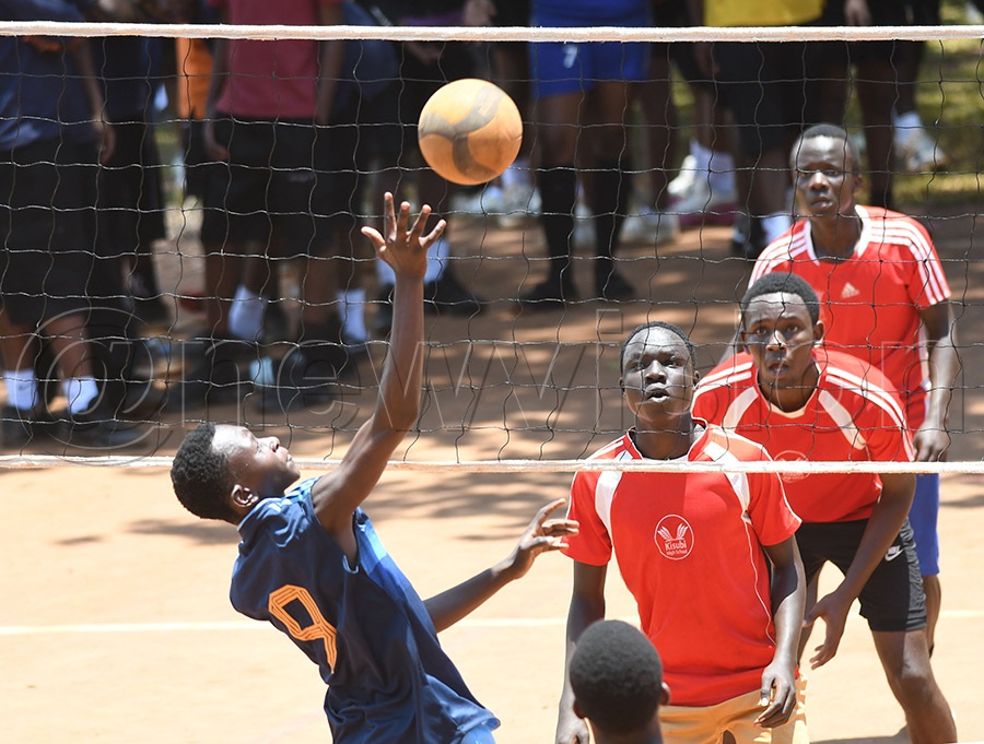 Volleyball action between Kisubi High School (in red) and Taibah during the Independence gala. Photo by Michael Nsubuga