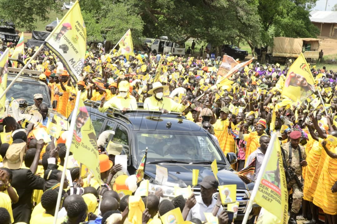 President Museveni accompanied by the First Lady and Minister of Education and Sports, Maama Janet Museveni, as they arrive at the campaign rally. (Photo by Eddie Ssejjoba)