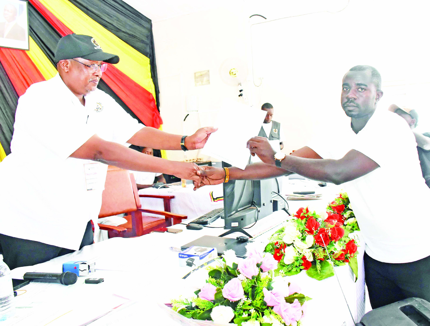 Denis Sekabira of NUP (right) who was declared the winner of Katikamu North Constituency. 