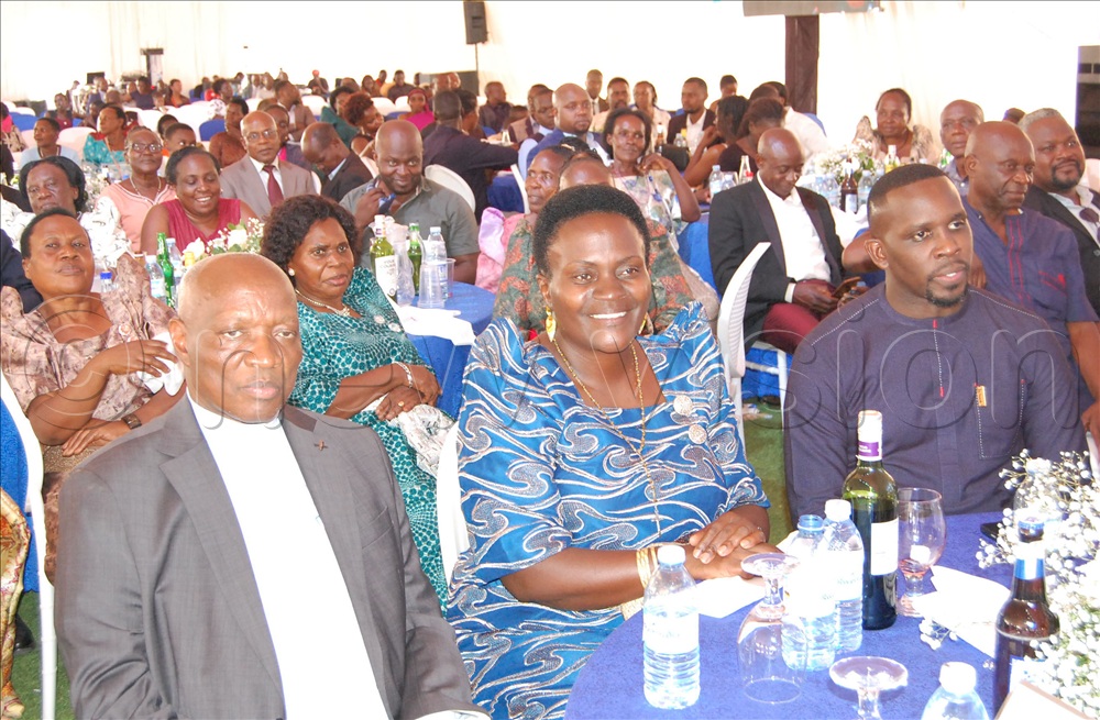 L-R: The Chancellor of Kampala Archdiocese, Fr. Dr. Pius Male Ssentumbwe, the Head of the Laity Emily Kitto Mwaka,  the Rt. Hon. Joel Senyonyi and other guests during the reception at Hill Side Primary School Naalya.
