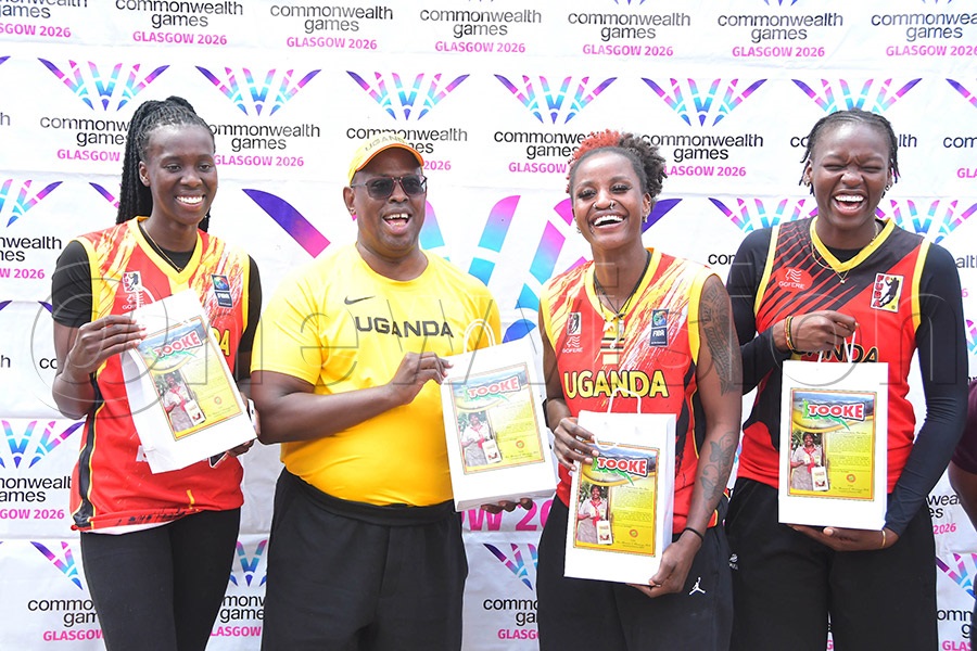 Commonwealth Games President and UOC President, Dr. Donald Rukare (second left), hands over Tooke food products to athletes at Lugogo to supplement their diet ahead of the Glasgow 2026 Games. (Photo: Silvano Kibuuka)