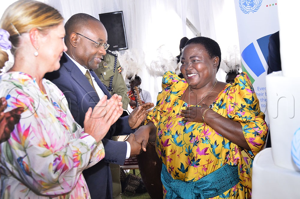 The Swedish Ambassador to Uganda, Maria Hakansson (left) chats with the Prime minister, Robinah Nabbanja (right) during the launch of UN Uganda sustainable development cooperation framework 2026 to 2030 at Kololo Independence Grounds Kampala. Center is the minister for Local Government, Raphael Magyezi. (Photo by Ronnie Kijjambu)